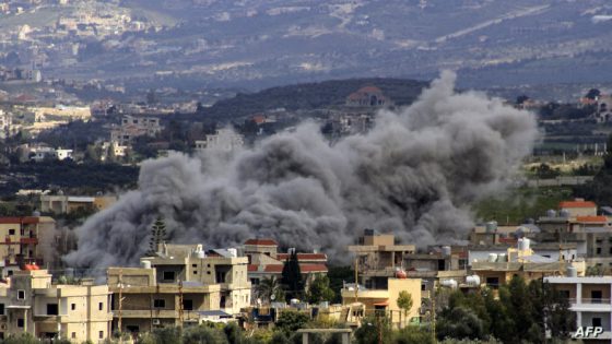 Smoke billows above buildings following an Israeli strike in the southern Lebanese border village of Majdal Zoun on March 9, 2024, amid ongoing cross-border tensions as fighting continues between Israel and Hamas militants in the Gaza Strip. (Photo by AFP)