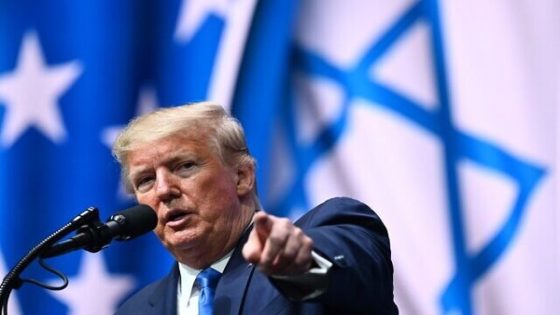 US President Donald Trump addresses the Israeli American Council National Summit 2019 at the Diplomat Beach Resort in Hollywood, Florida on December 7, 2019. (Photo by MANDEL NGAN / AFP)